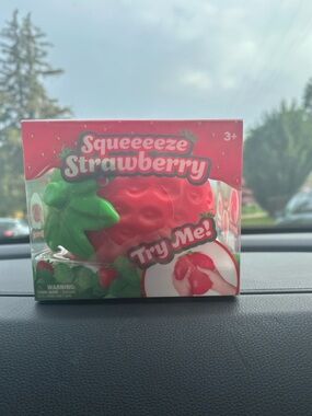 Squeeeeze strawberry stress toy